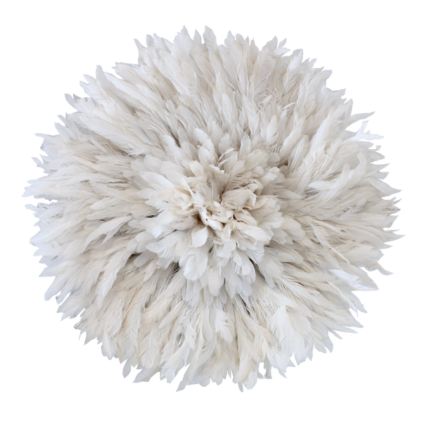 Traditional round headdress made from white feathers used as wall decor. 